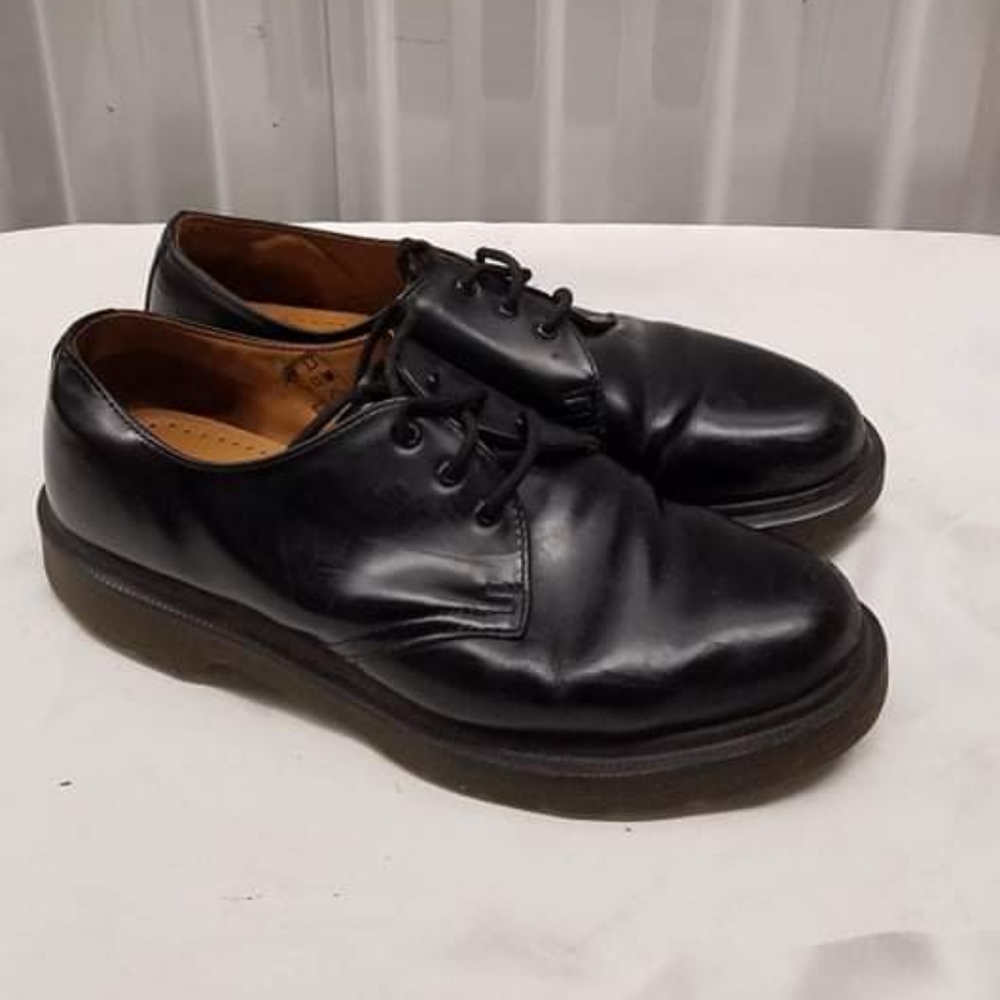 Dr. Martens Black Flats Timeless Style and Comfort